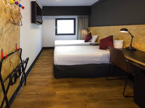A modern Ibis Budget hotel room