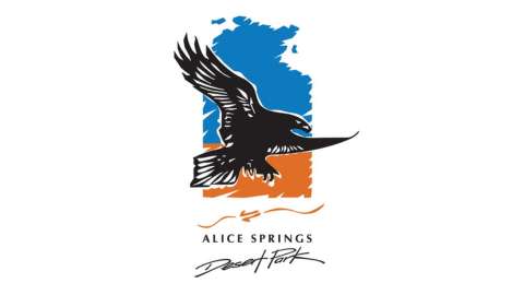 Logo of Alice Springs Desert Park featuring a stylized bird in black silhouette over an abstract background of blue and orange. The text below reads "Alice Springs Desert Park" with a wavy line design, highlighting its focus on ecotourism.