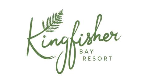 Kingfisher Bay Resort logo featuring nature-inspired cursive text with a fern leaf accent, symbolizing ecotourism.