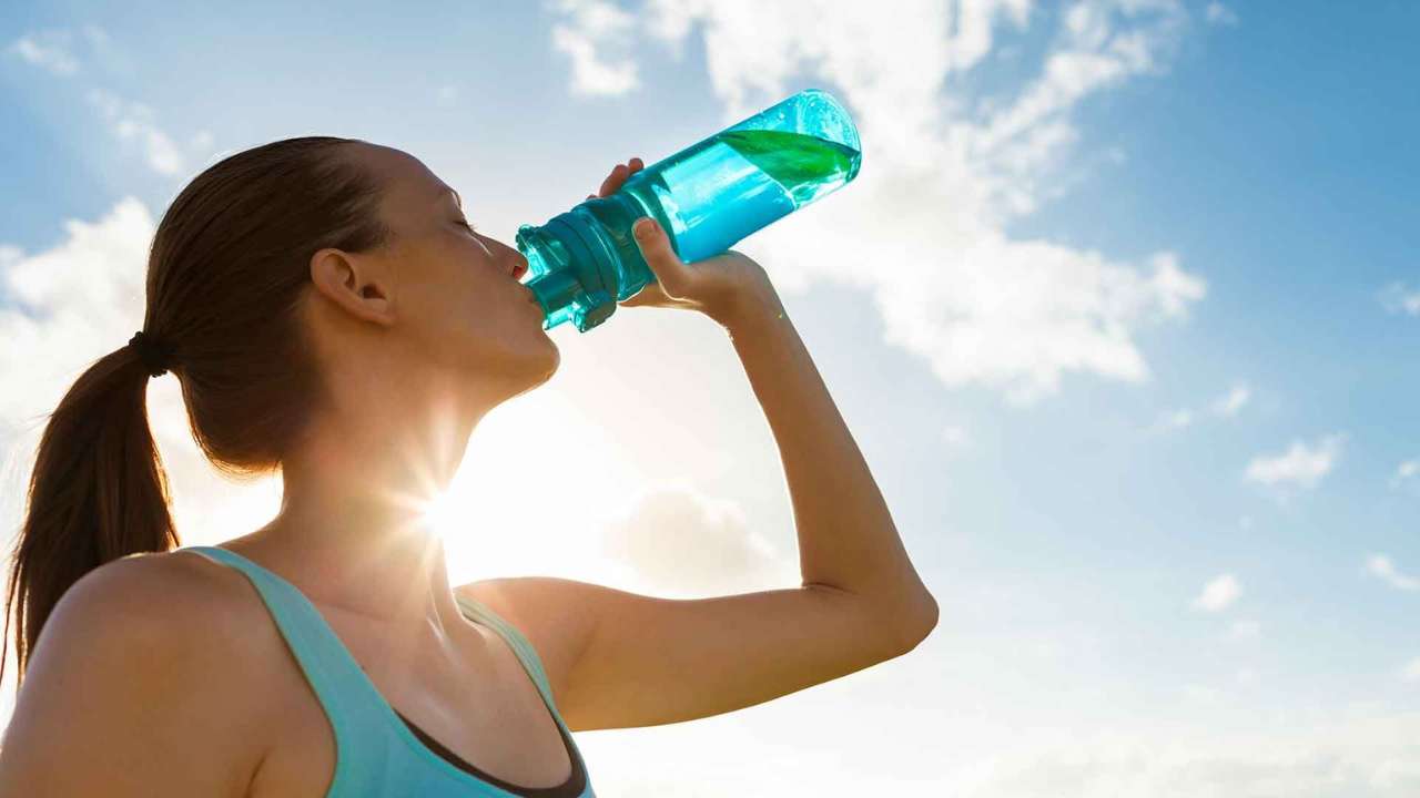 Woman drinking water bottle