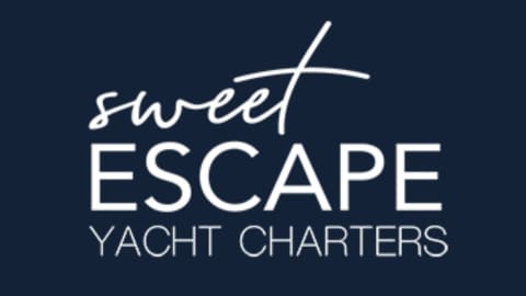 Logo for Sweet Escape Yacht Charters featuring white text on a dark blue background, highlighting our commitment to sustainable luxury and comfortable accommodation.